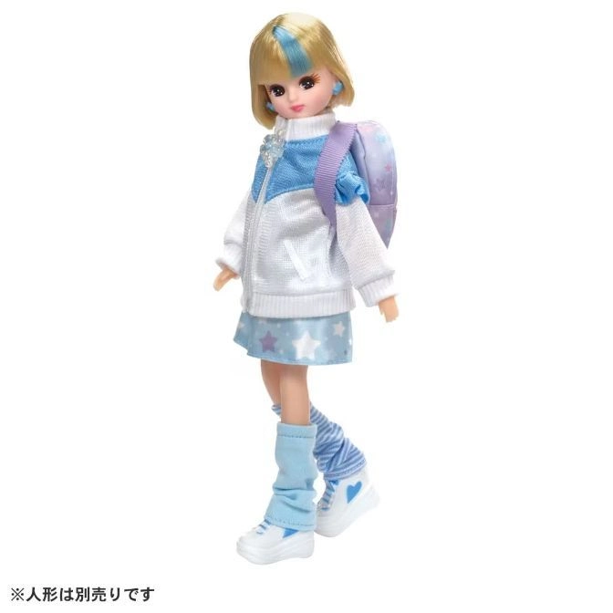  Licca-chan doll with backpack, wearing a white and blue jacket, skirt, leg warmers, and sneakers.
