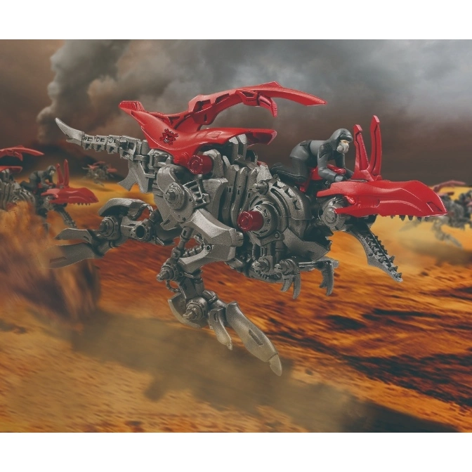  Grey and red Zoids toy with a figure riding it, set against a desert backdrop.