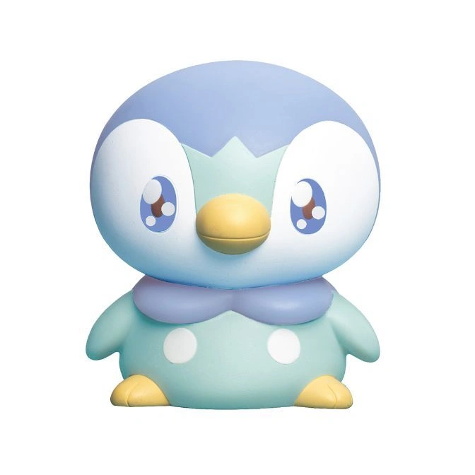 Piplup toy figure with blue head, yellow beak, and light blue body.