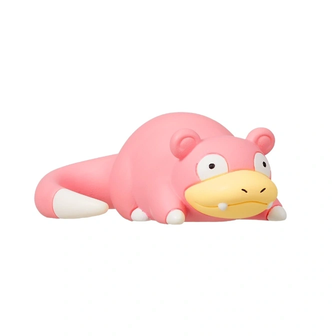  Pink Slowpoke toy lying down with a white-tipped tail and yellow snout.