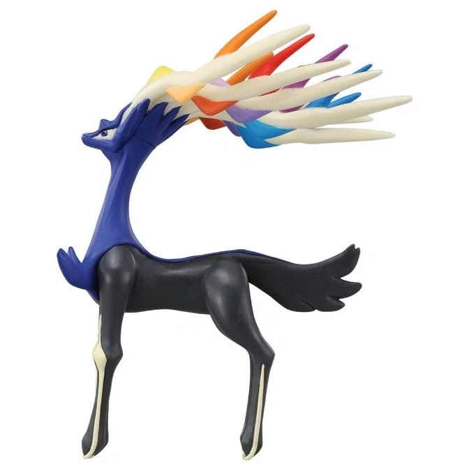  Xerneas toy figure with rainbow antlers, standing.