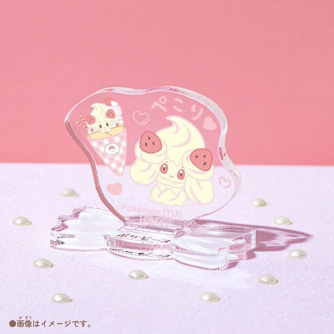  Alcremie Pokémon acrylic standee with ice cream cone design on a pink surface with pearl accents.