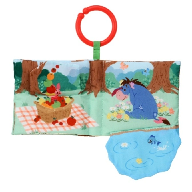  Eeyore soft book with picnic scene and pond flap, featuring a red teether ring.