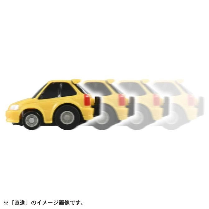  Yellow toy car in motion, showing a blurred effect of movement.