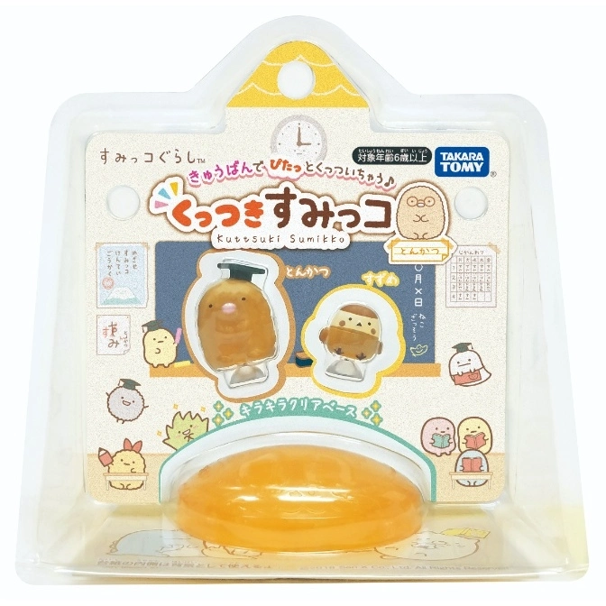 Sumikko Gurashi Kuttsuki Sumikko toy set featuring Tonkatsu figures with graduation caps and a clear base.