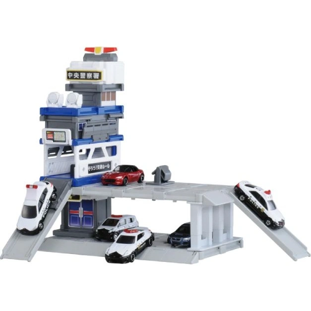  Toy police station with cars on ramps and parked. Features a tower and parking garage.