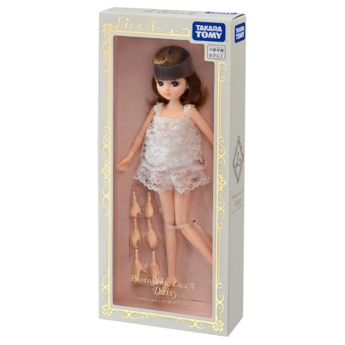  Licca doll in box with extra hands, wearing white lace top and headband. Takara Tomy toy.