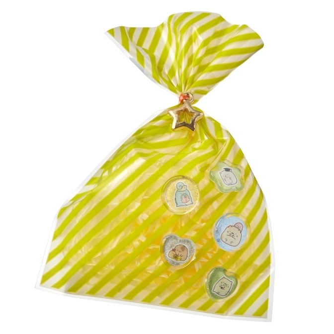  Striped gift bag with Sumikko Gurashi character candies and a star charm.