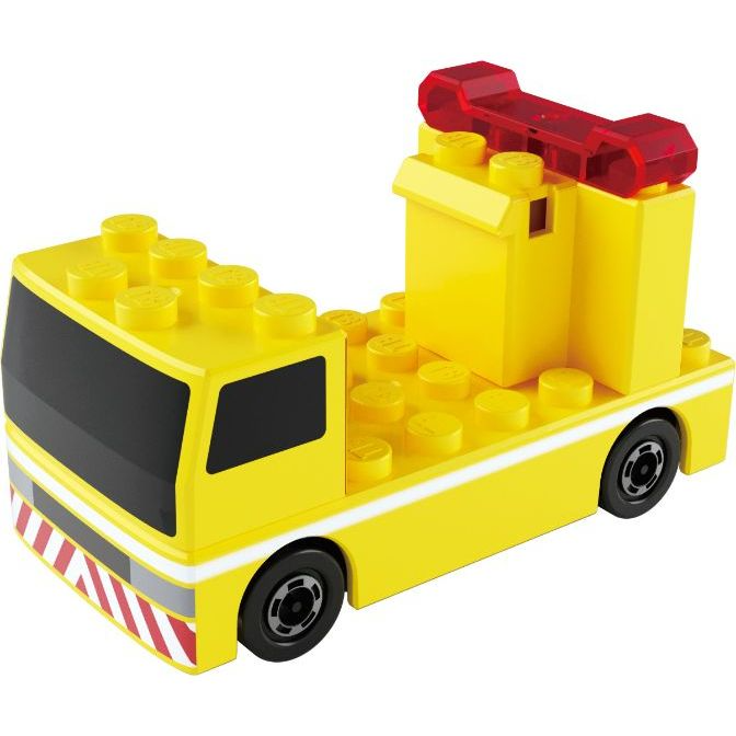  Yellow toy tow truck made of building blocks with red light bar.