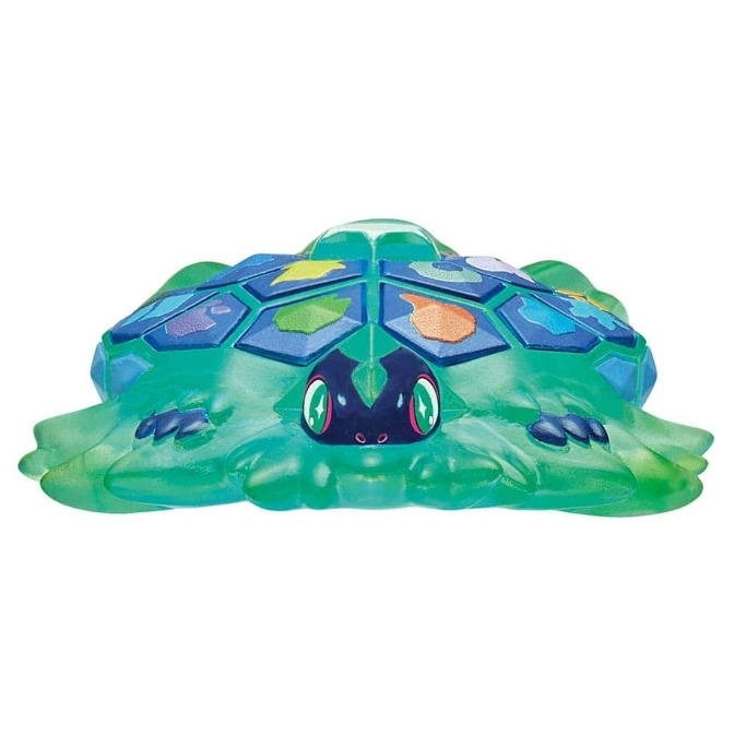  Green turtle toy with colorful geometric shell.