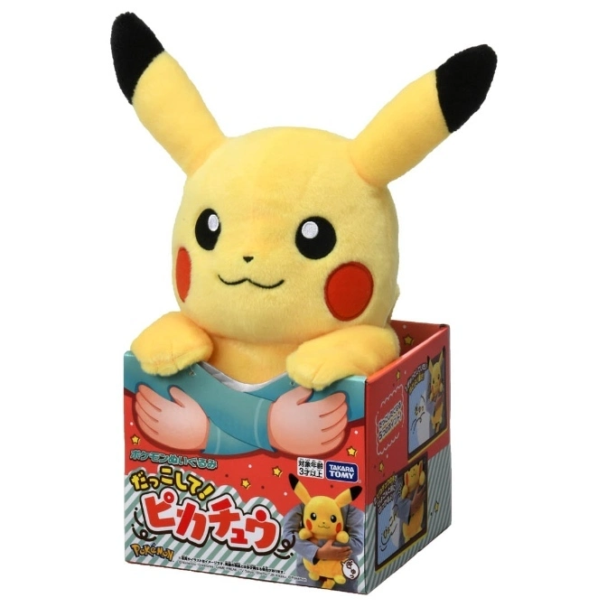 Pikachu plush toy in box with hands graphic.