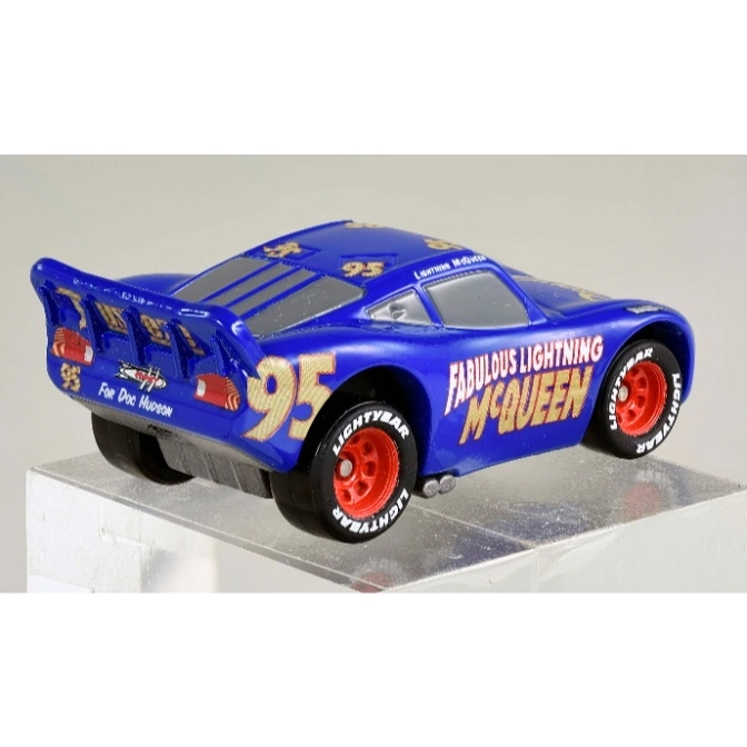  Blue Fabulous Lightning McQueen toy car with red wheels and gold accents.