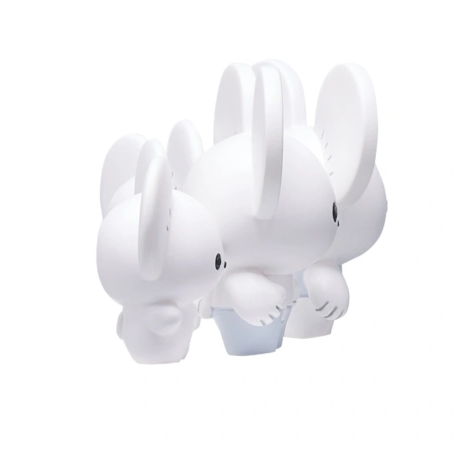  Three white Miffy toys stand in a row, each slightly larger than the last.