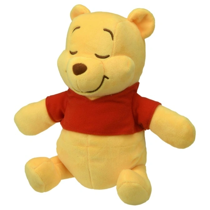 Winnie the Pooh plush toy with red shirt, eyes closed, smiling.