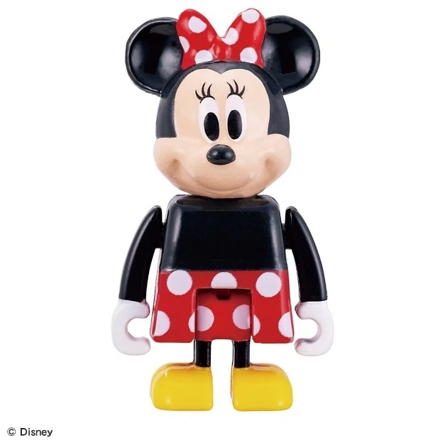  Minnie Mouse toy figure with red polka dot bow and dress, yellow shoes.