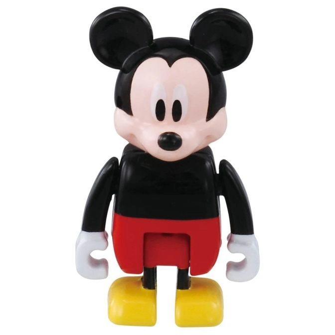  Mickey Mouse toy figure with black head and body, red shorts, yellow shoes, and white gloves.