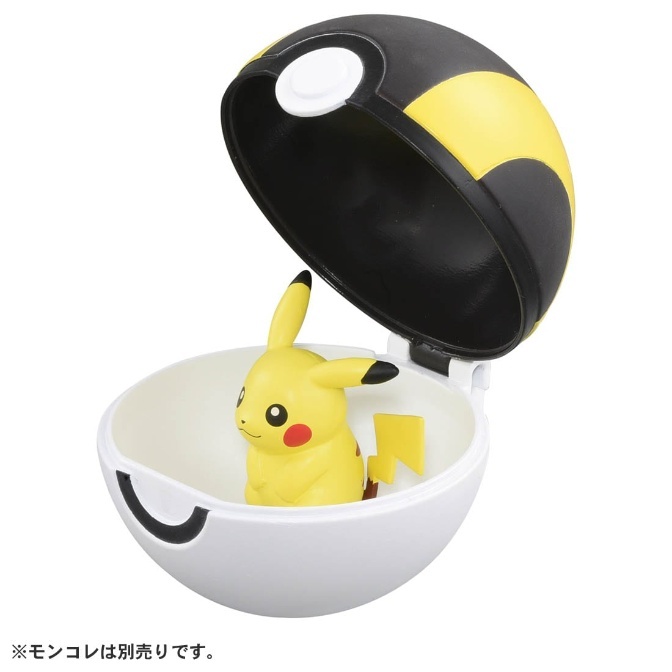 Pikachu figurine inside an open black and white Poké Ball toy.