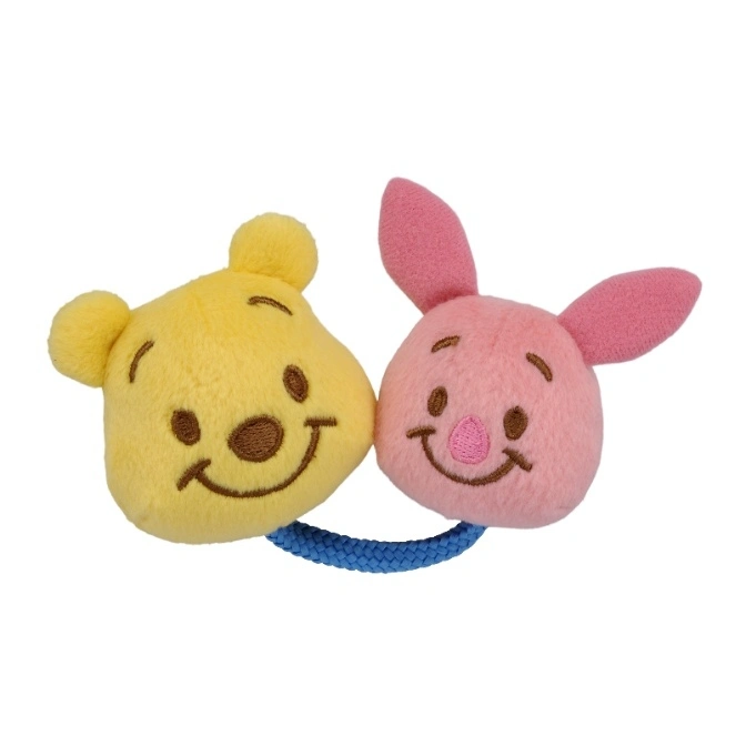 Winnie the Pooh and Piglet plush rattle toy with blue ring.