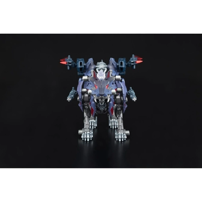  Beast-mode Transformer toy with wings and guns, standing on a black surface.
