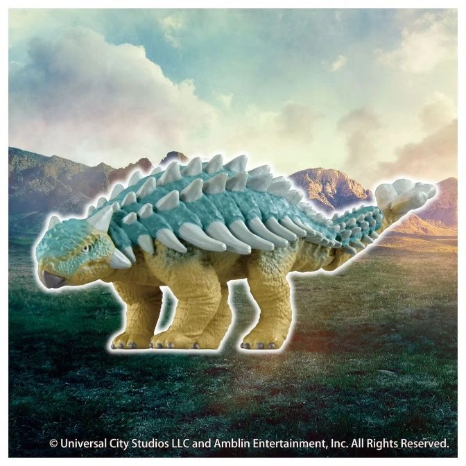  Ankylosaurus toy with blue and tan coloring and white spikes on its back.